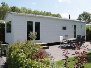 Tidy chalet with a microwave, near the Wadden Sea